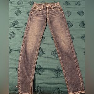 Size 00 long American eagle jeans for sale.